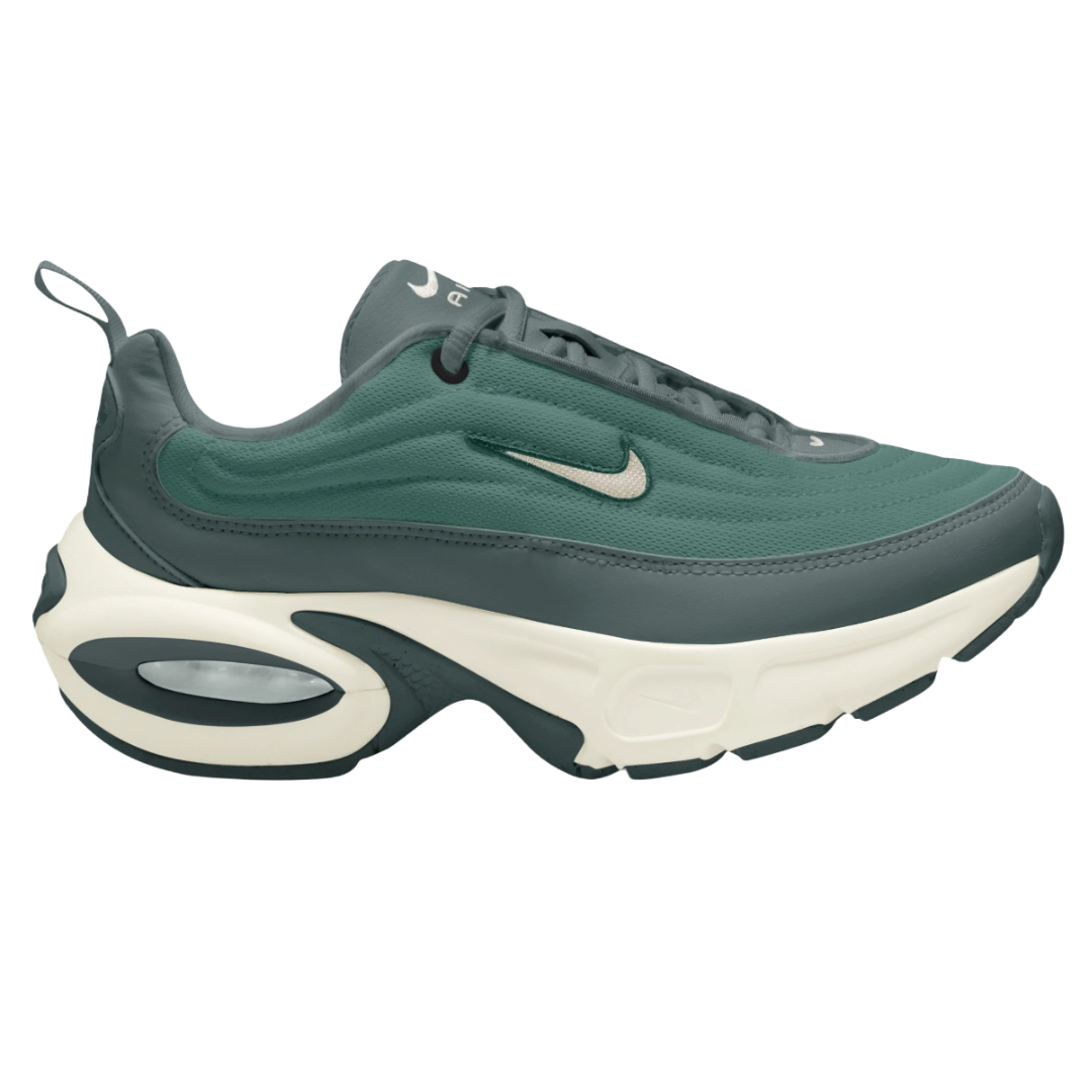 Nike sneaker with a teal and dark gray upper, cream midsole, and visible Air unit. Features a Swoosh logo on the side.