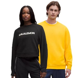 Two people wear casual long-sleeve tops: a black Lululemon sweatshirt and a bright yellow pullover.