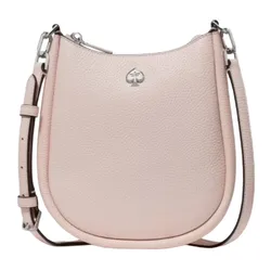A light pink, textured leather crossbody bag with a silver logo, adjustable strap, and zipper closure.