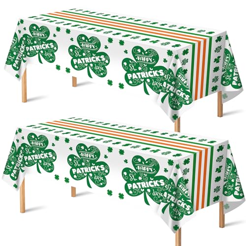 Two St. Patrick's Day themed tablecloths with green shamrock patterns and festive greetings on a white background.