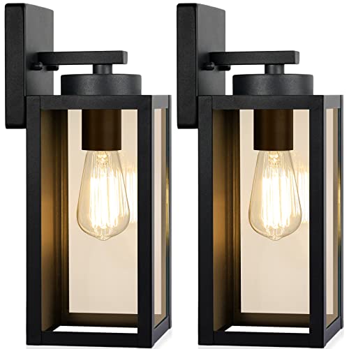 Two rectangular black outdoor wall lights showcasing exposed filament bulbs inside clear glass panels, mounted on a flat backing plate.