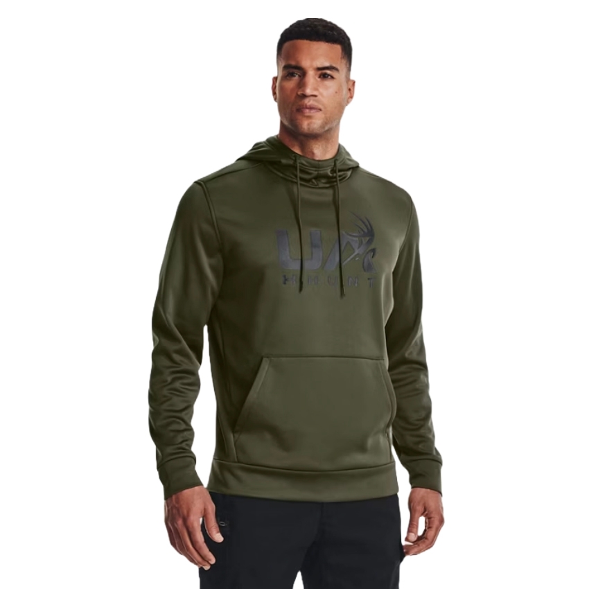 The UA Hunt Logo Hoodie is olive green, featuring a front pocket and a drawstring hood. It has a graphic design with the text \“UA HUNT\“ on the chest.