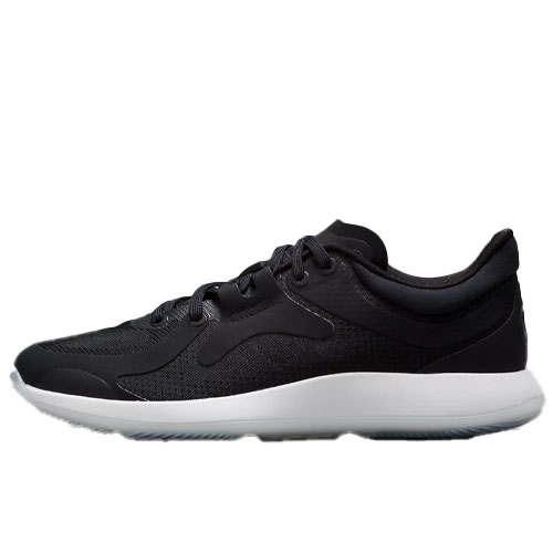 A black athletic shoe with a sleek design, featuring a mesh upper and a white textured sole for grip.