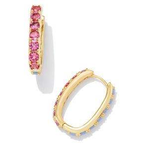Gold hoops with oval shape, embedded with pink and blue stones. The front features pink stones, while the back showcases a subtle blue lining.