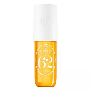 Sol de Janeiro Cheirosa 62 Perfume Mist features a warm, sweet fragrance with notes of pistachio, salted caramel, and vanilla. The bottle is orange with a white cap and the number \“62\“ prominently displayed.
