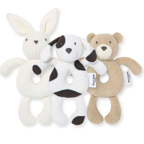 Three soft rattles shaped like a bunny, a dog, and a bear, each with a looped body for easy gripping.