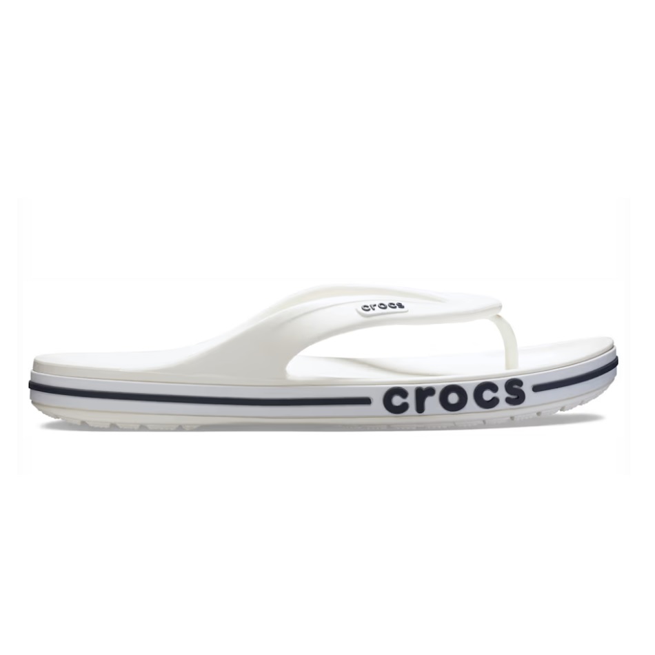 White Crocs Bayaband Flip Flops featuring a simple design with a comfortable footbed. They have a thick sole with a navy-blue stripe and the \“Crocs\“ logo on the side.