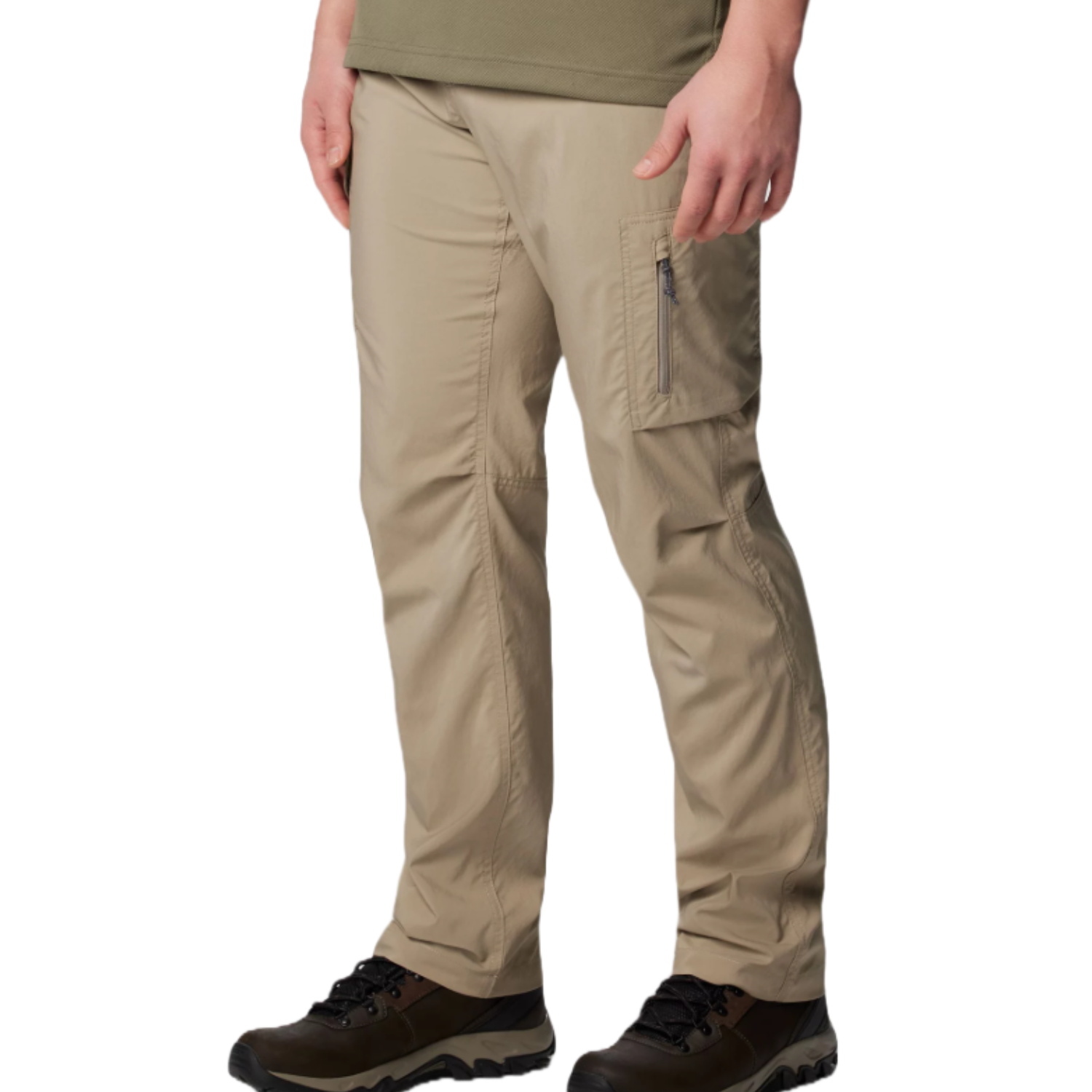 Beige cargo pants with a side zippered pocket, worn by a person standing in black and brown hiking boots.