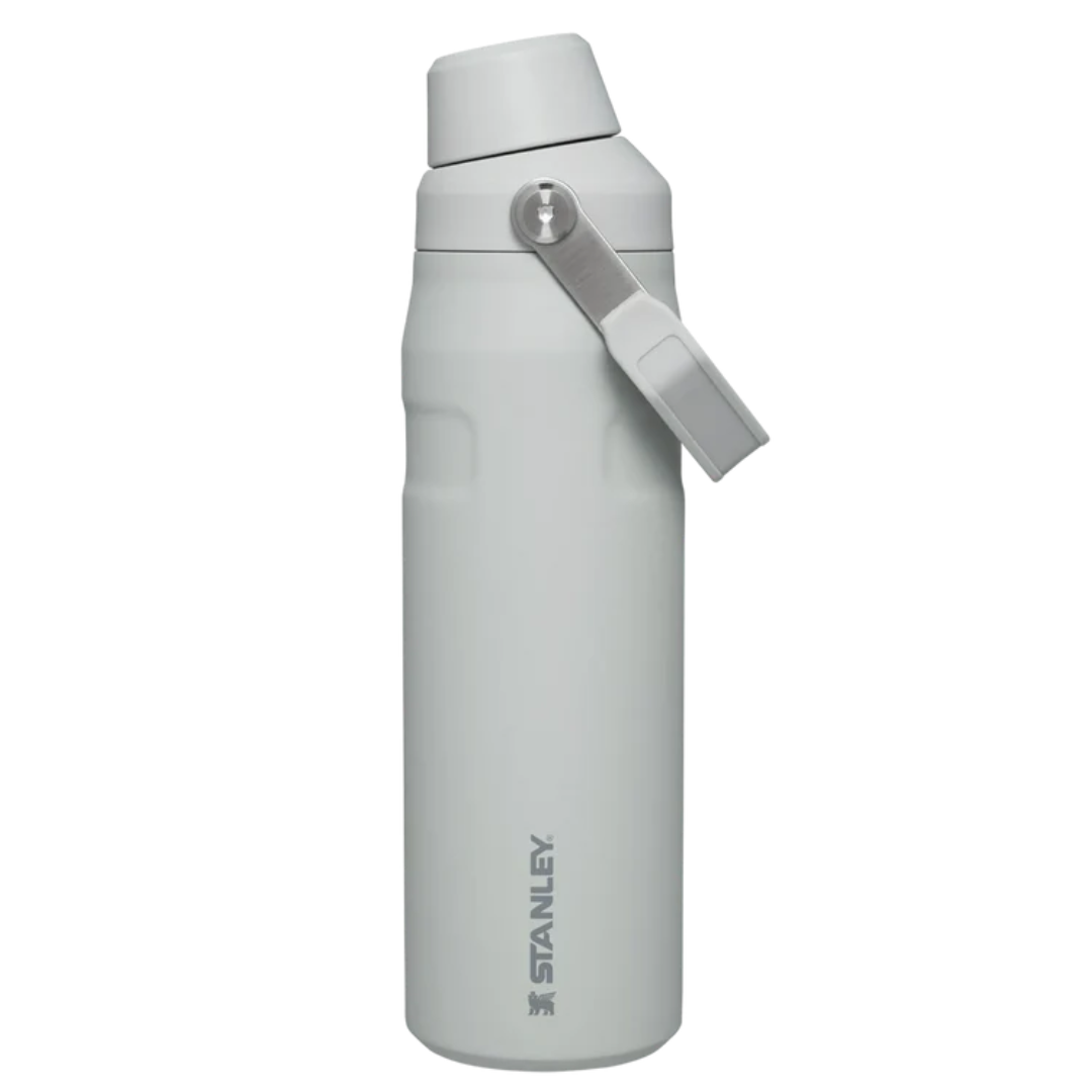 A gray Stanley water bottle with a swivel spout lid and carrying handle.