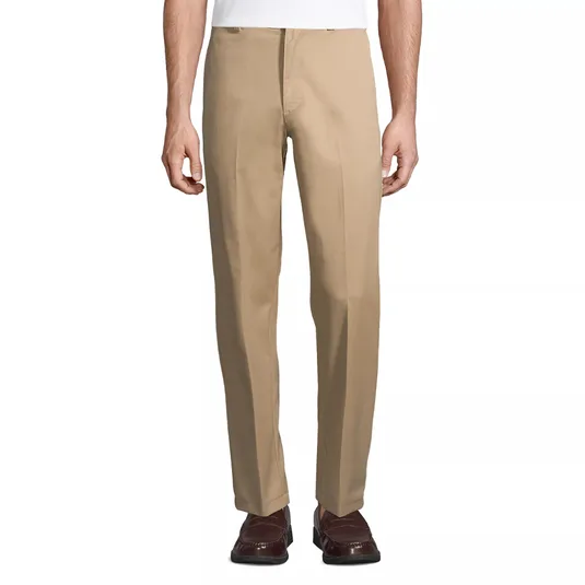 Khaki dress pants worn with brown loafers.