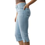 Light blue denim capri pants with a side slit at the hem, worn with a brown cropped top.