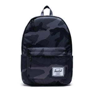 A black and dark gray camo-patterned backpack with a front zipper pocket and a small white label.