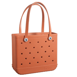 Orange tote bag with a perforated design, featuring circular holes and two handles.