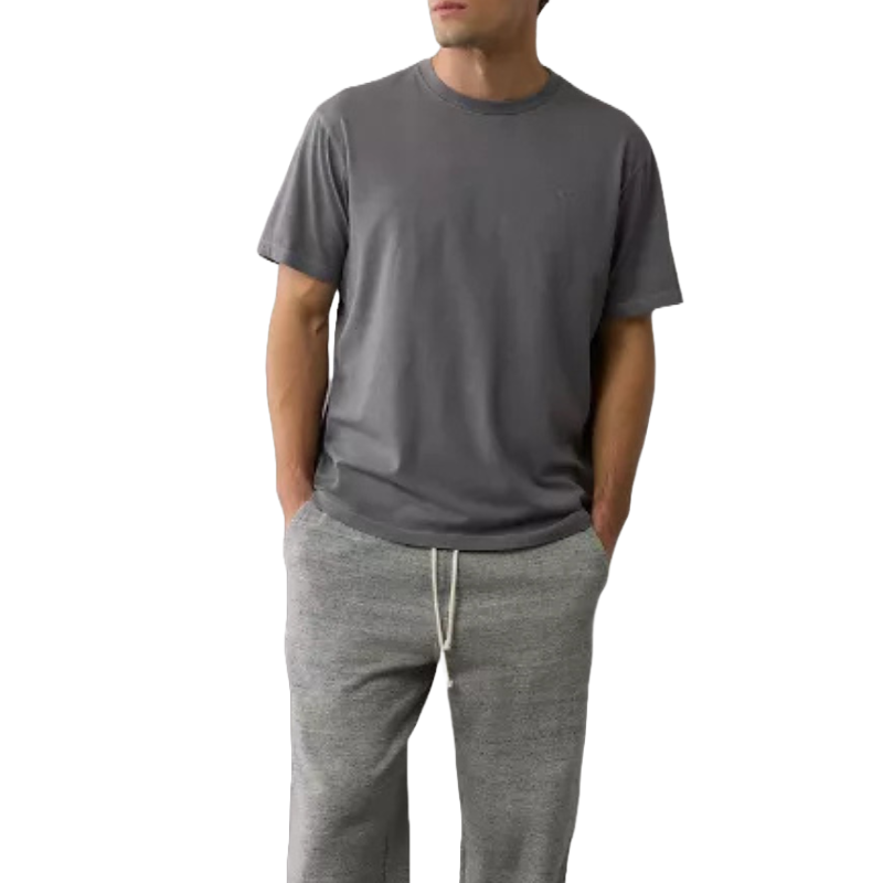 A gray short-sleeve T-shirt with a relaxed fit and a subtle logo on the chest, paired with gray drawstring sweatpants.