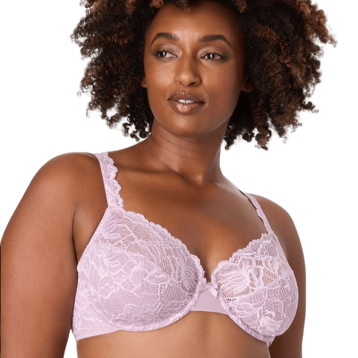A woman is wearing a lavender lace bra with thin straps and a supportive underwire design.