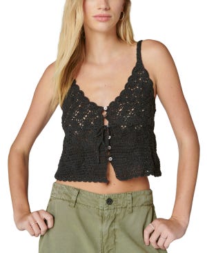 A black crochet tank top with a tie-front design and three frontal buttons, paired with olive green pants.