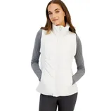 A woman is wearing a white quilted vest over a gray long-sleeve shirt with black pants.