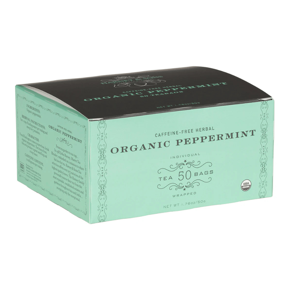 Box of organic peppermint tea, caffeine-free herbal blend, containing 50 individually wrapped bags, with a net weight of 1.76 oz (50g).