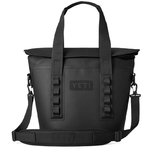 A black YETI tote bag with shoulder and hand straps, featuring a durable, minimalist design.