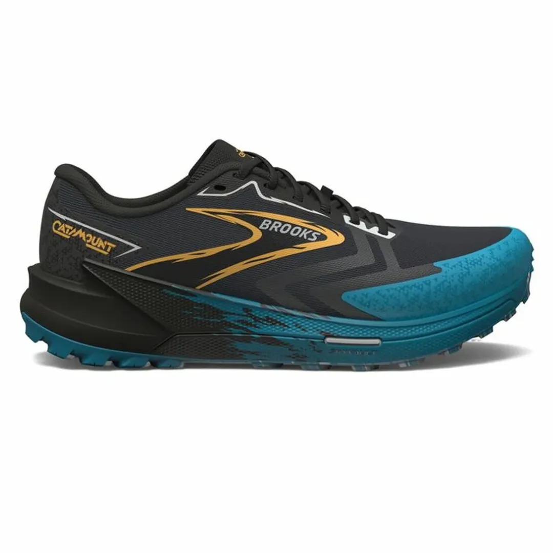 Brooks Catamount trail-running shoe featuring a black and teal design with gold accents, designed for performance on rugged terrain.