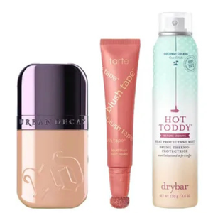Urban Decay foundation, Tarte Blush Tape liquid blush, and Drybar Hot Toddy heat protectant mist.