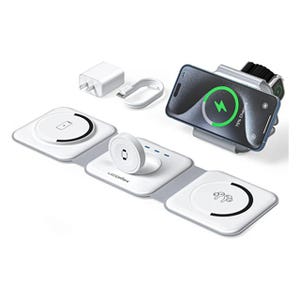 A modular charging station with multiple wireless charging pads for devices such as a smartwatch, earbuds, and a smartphone.