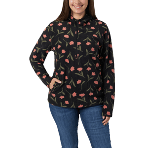 The O'Neill Josie Half-Zip Hoodie features a black fleece fabric with a floral print of pink flowers and green leaves. It includes a half-zip front and side pockets, worn with blue jeans in the image.