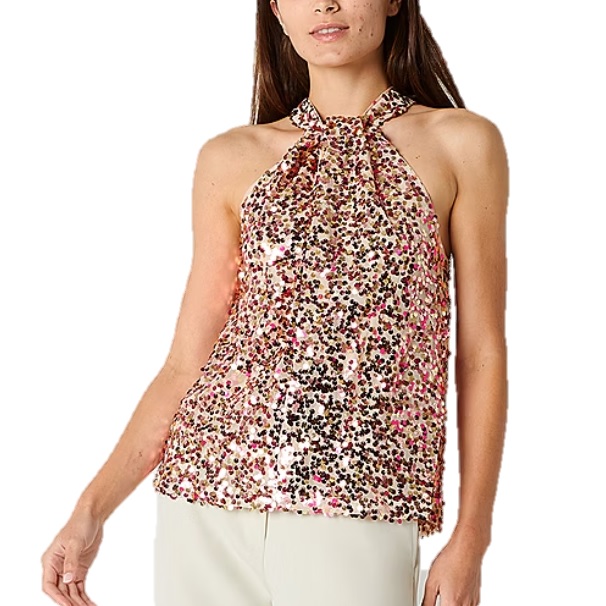 Sequined halter neck top with a multicolored pattern, paired with light-colored pants.