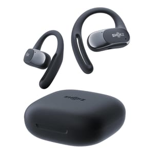 Shokz open-ear headphones with ear hooks offer a secure fit and come with a compact charging case. The design is sleek and modern, prioritizing both comfort and functionality.