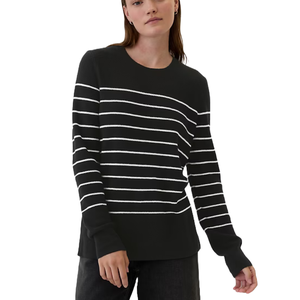 A black sweater with thin white horizontal stripes and long sleeves. The person wearing it is paired with dark pants.