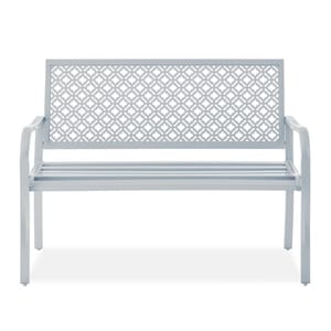 Light gray bench with a geometric cutout backrest and straight armrests, made of steel. Ideal for outdoor use with a simple and modern design.