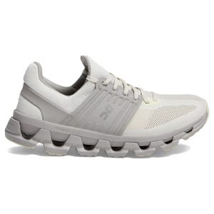 A light gray running shoe with a distinctive sole design and yellow accents.