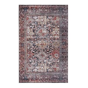 A rectangular area rug with an intricate geometric pattern in red, blue, and beige tones, featuring traditional motifs and a wide decorative border.