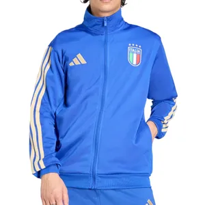 A blue track jacket featuring the Italy national soccer team logo, with beige Adidas stripes on the sleeves and the Adidas logo on the chest.