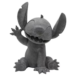 A gray stone-like figure of Stitch from Disney's \“Lilo & Stitch,\“ featuring a playful pose with one arm raised.