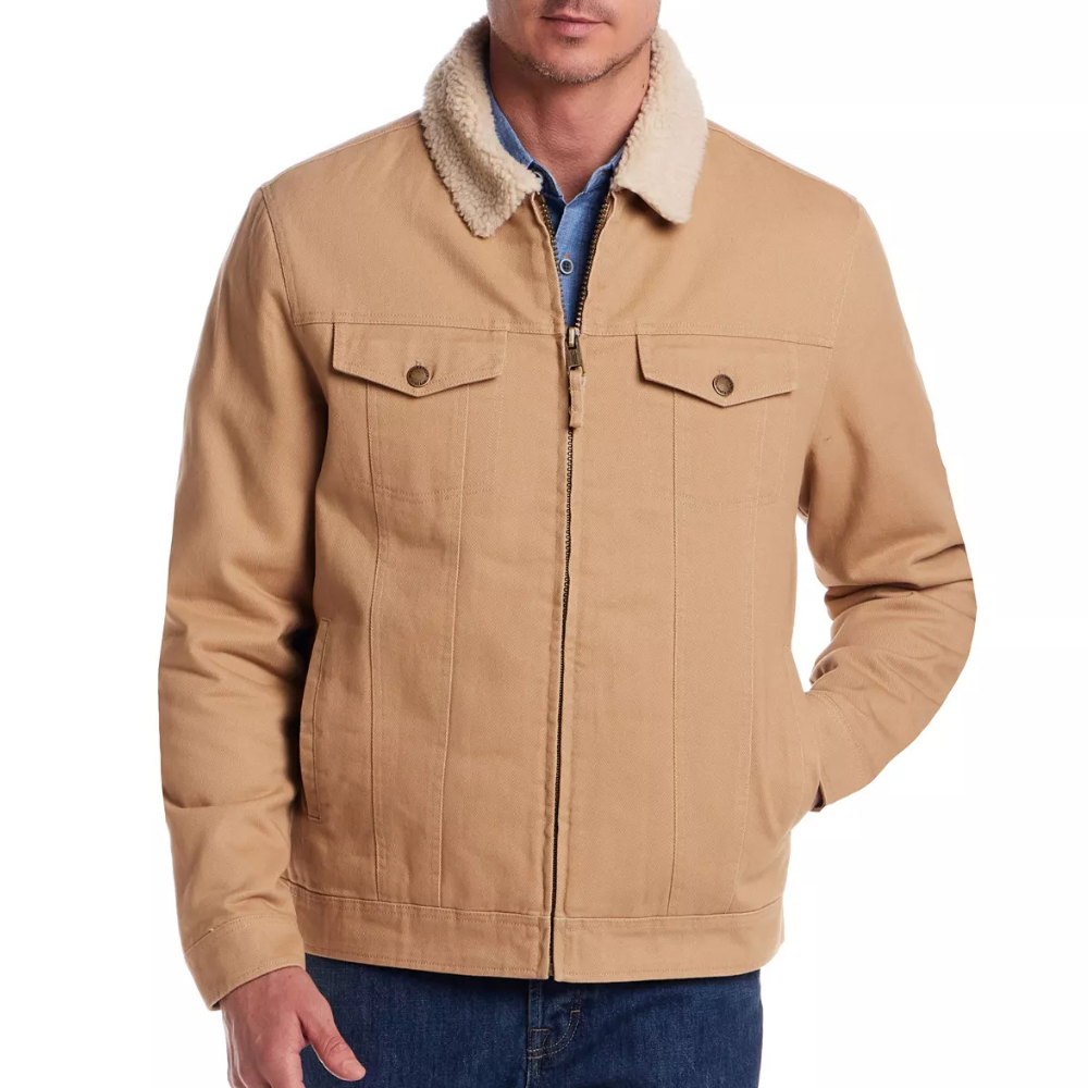 Tan jacket with a white sherpa collar, front zipper, two chest pockets, and side pockets, paired with blue jeans.