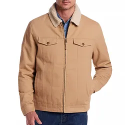 Tan jacket with a white sherpa collar, front zipper, two chest pockets, and side pockets, paired with blue jeans.