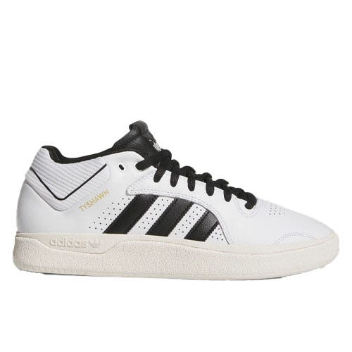 White and black Adidas skateboarding shoe with three stripes on the side and gold \“TYSHAWN\“ text.