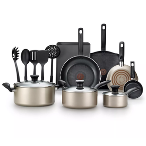 A cookware set featuring non-stick pots, pans, and cooking utensils. Items include a saucepan, frying pans, a stock pot, baking sheets, and tools like a spatula, ladle, and spoon.