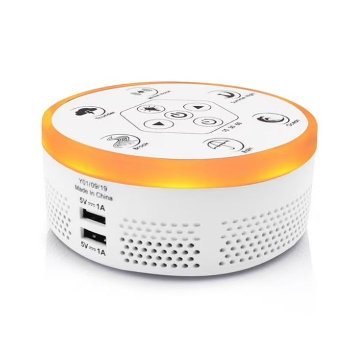A compact white noise machine with a circular design, featuring sound options like ocean waves, birds, and lullabies, and equipped with USB charging ports.