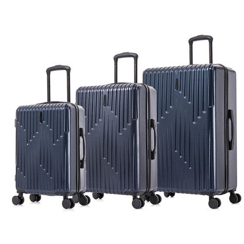A set of three navy blue hard-shell suitcases with telescopic handles and four spinner wheels each, displayed in different sizes.