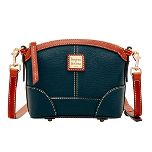 Dooney & Bourke Mini Crossbody in dark blue leather with tan accents, featuring contrast stitching and a gold logo plate. It has a detachable leather strap with gold hardware.
