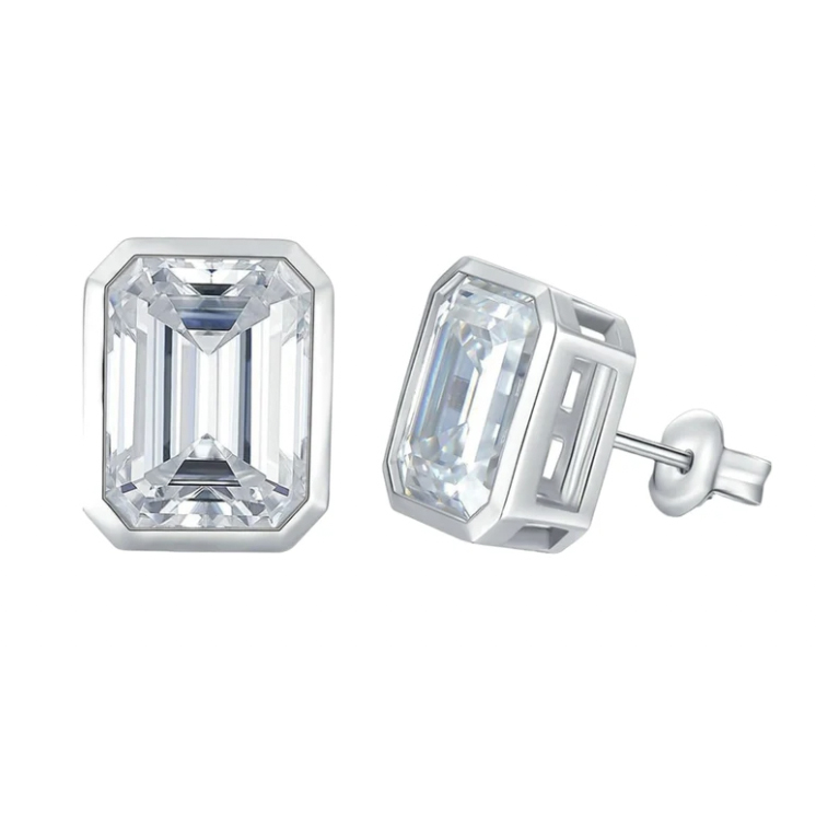 Silver stud earrings featuring rectangular, emerald-cut clear gemstones set in a bezel-style setting.