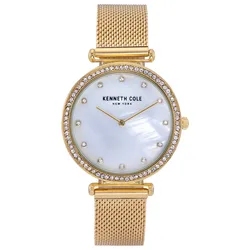 A Kenneth Cole New York gold watch with a mother-of-pearl dial, crystal hour markers, and a crystal-embellished bezel, featuring a gold mesh strap.