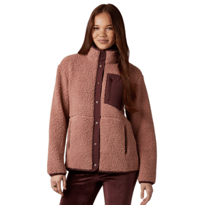 A woman is wearing a mauve colored, textured fleece jacket with a high collar, button closure, and a contrasting front pocket detail.
