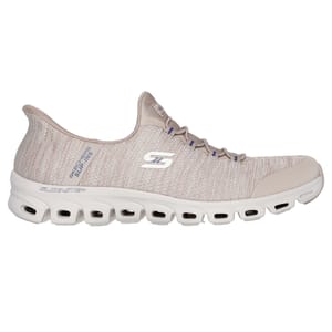 Beige Skechers Slip-Ins shoe with a mesh upper, featuring a logo on the side, and a white Glide-Step sole with crescent-like cutouts for cushioning and flexibility.