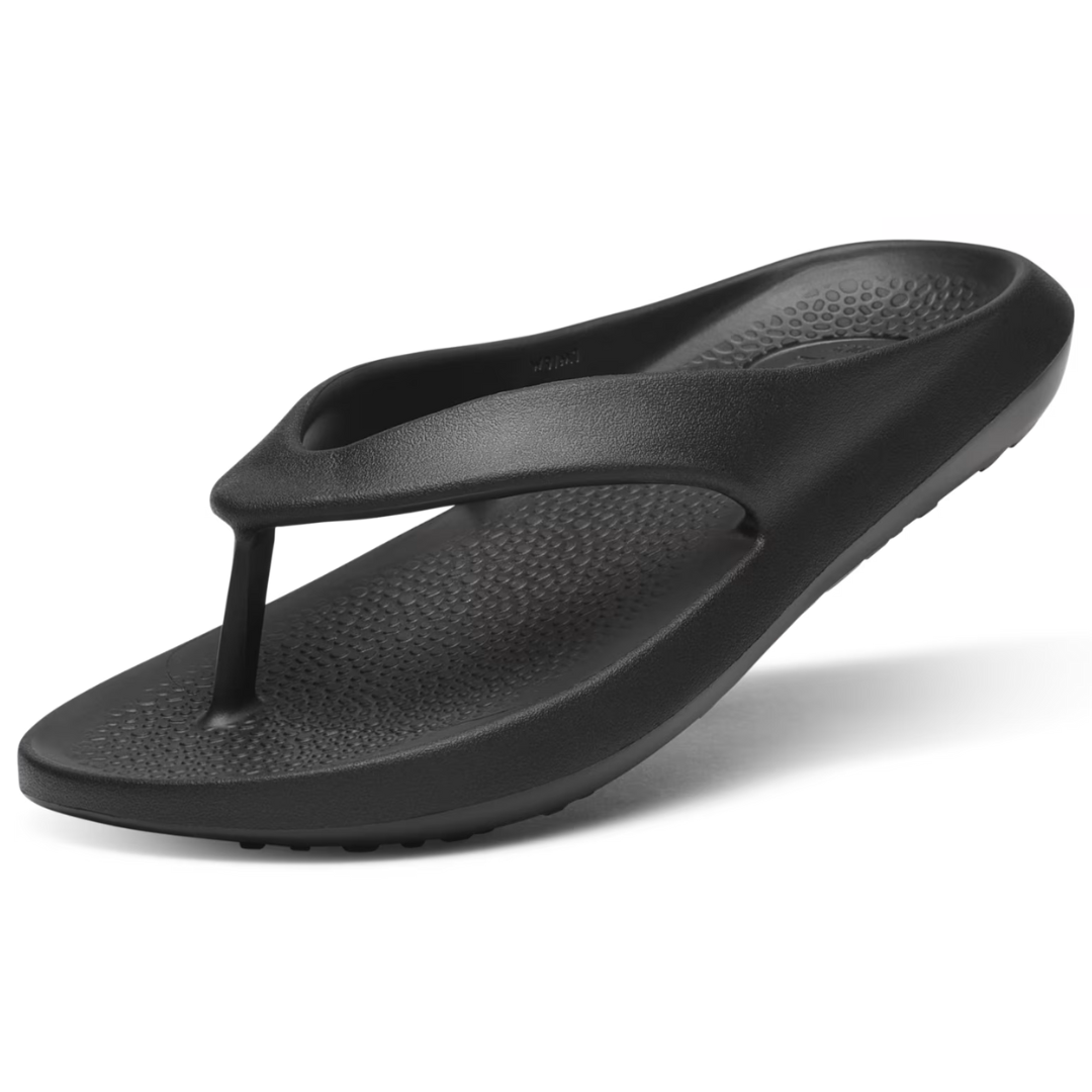Allbirds Sugar Zeffer Sandals are sleek black flip-flops made from eco-friendly materials, featuring a textured footbed for comfort and a minimalist design.