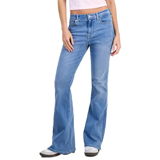 Light blue flare jeans with classic five-pocket styling, paired with a white cropped top and sneakers.