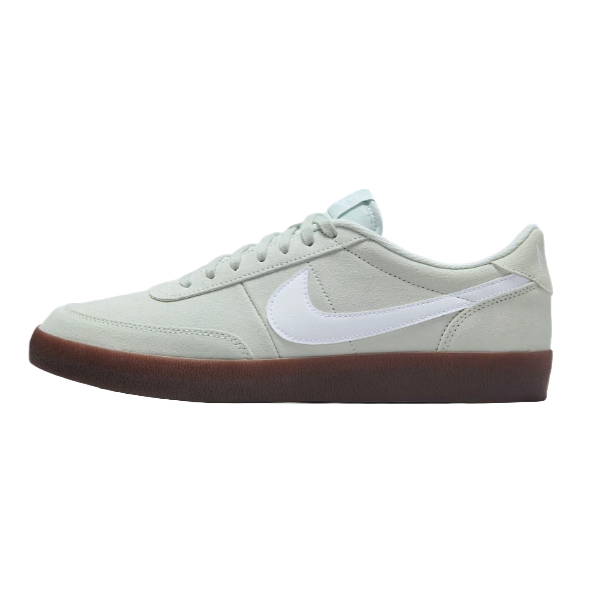 A light gray Nike sneaker with a white Swoosh logo and a gum sole, featuring a minimalist design and lace-up closure.