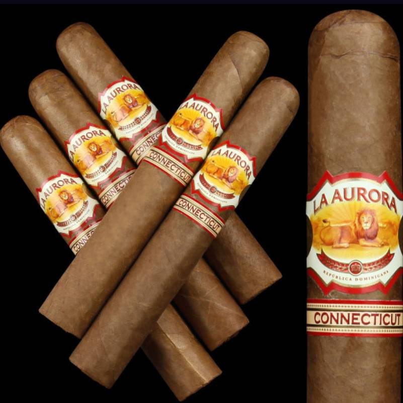 A collection of La Aurora Connecticut cigars with red and gold bands featuring a lion graphic.